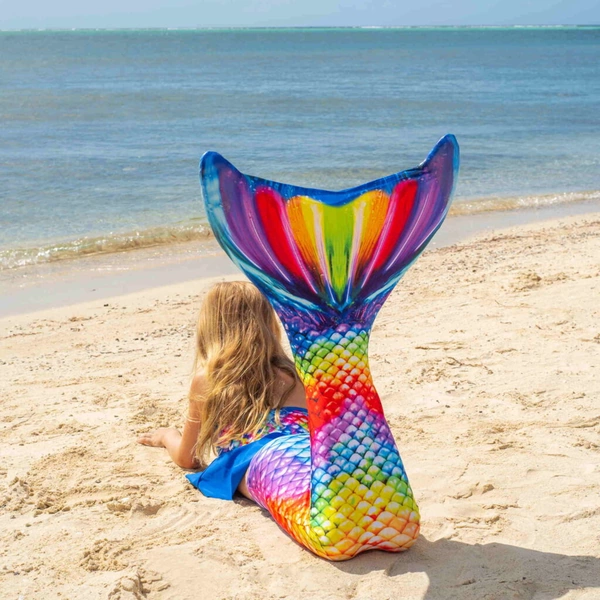 zeemeermin staart rainbow reef liggend zee